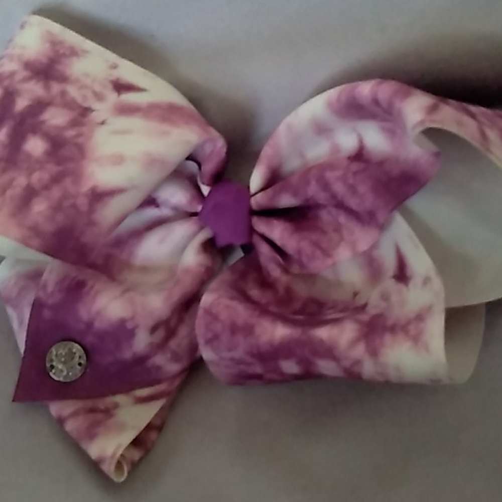 Purple and white tie-dye bow